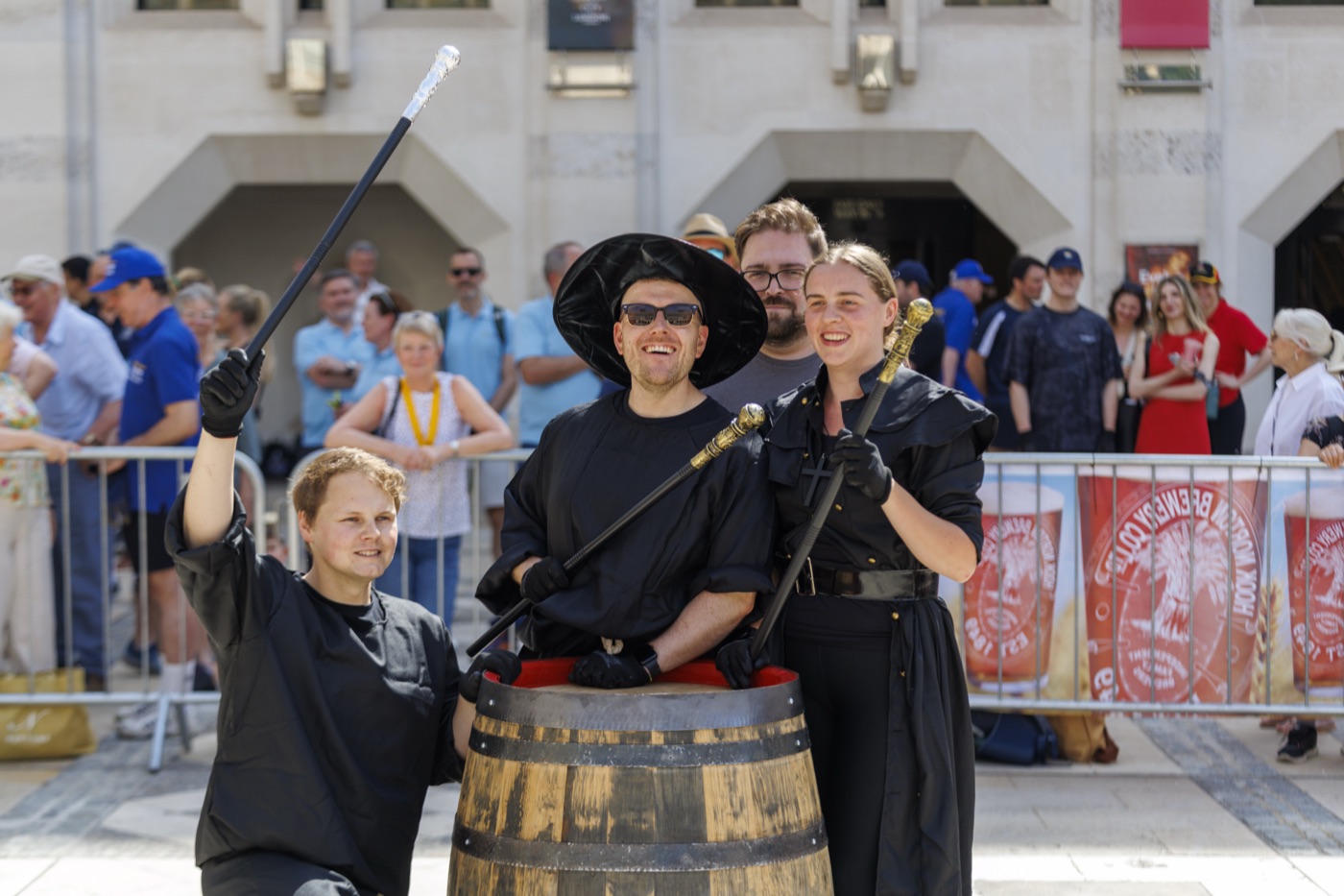 A cooper working a cask at the event